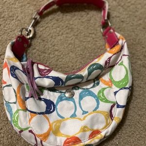 Coach shoulder half moon shape handbag The measurements are in the photos.